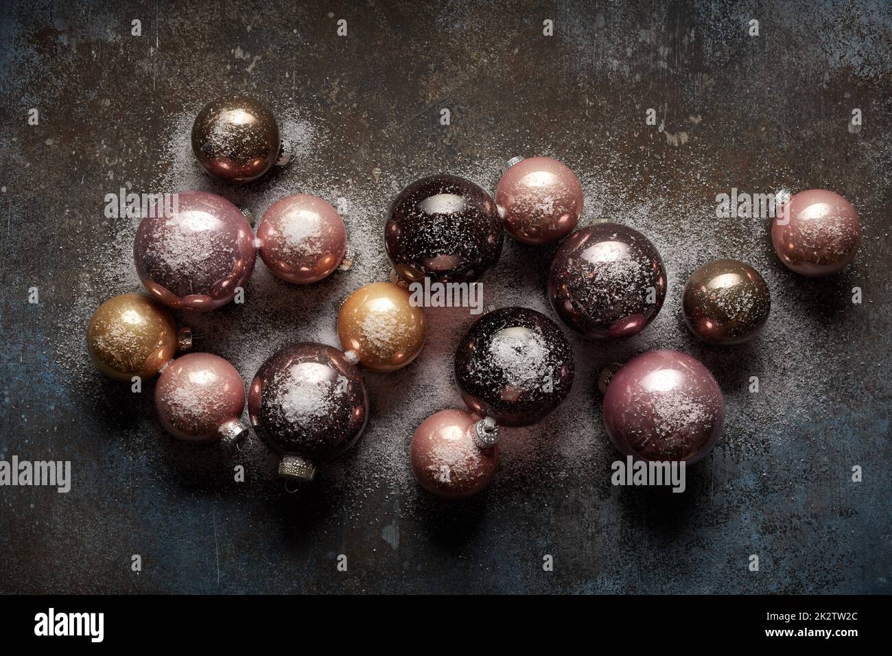Colorful Christmas baubles on dark table Stock Photo