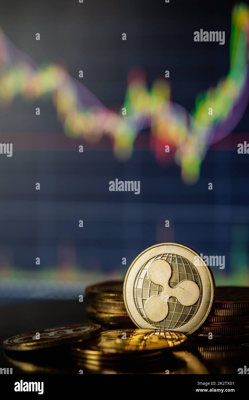 Gold Ripple with candle stick graph chart and digital background Stock