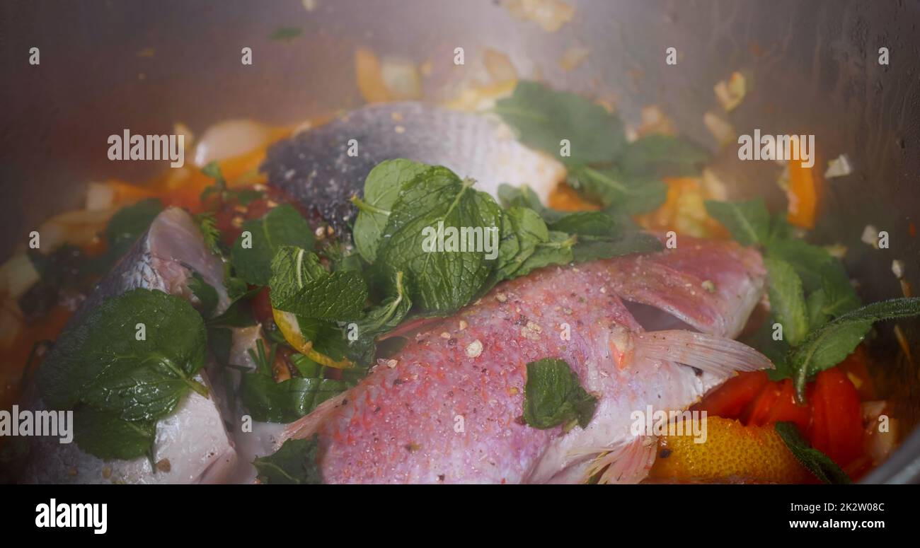 Cooking Seafood Mediterranean Dish Preparation. Fresh Mollusks Fish Shell Shrimp. Stock Photo