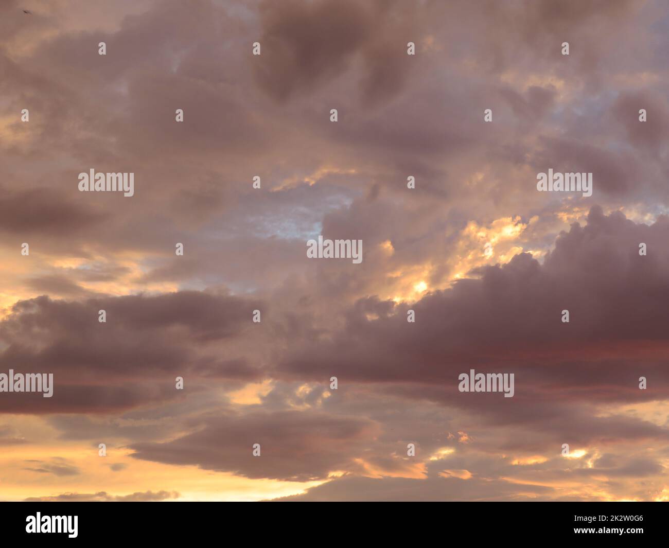 storm clouds with intense light brown colors strange sky Stock Photo
