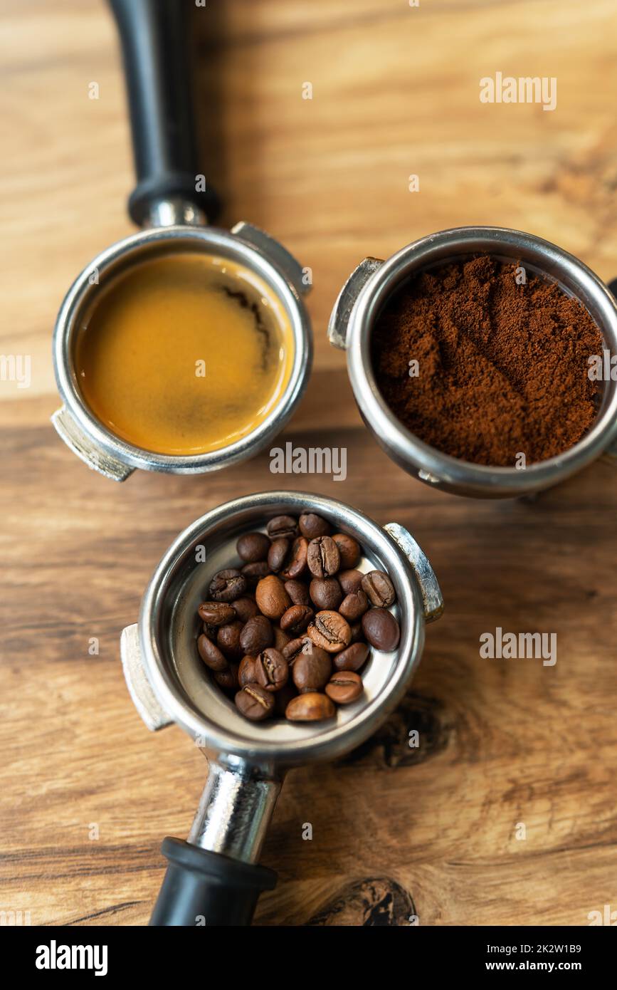 Different processes of preparing coffee by a barista in a coffee shop
