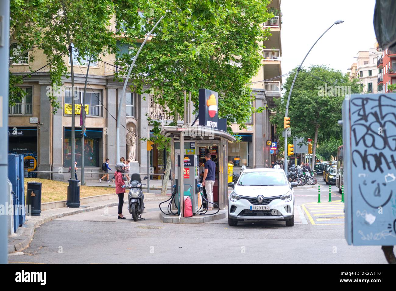 A long road with cars and nearby buildings and trees in Barcelona, Spain  Stock Photo - Alamy