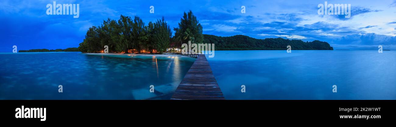 Pier of Carp Island in Palau at evening time in twlilight Stock Photo