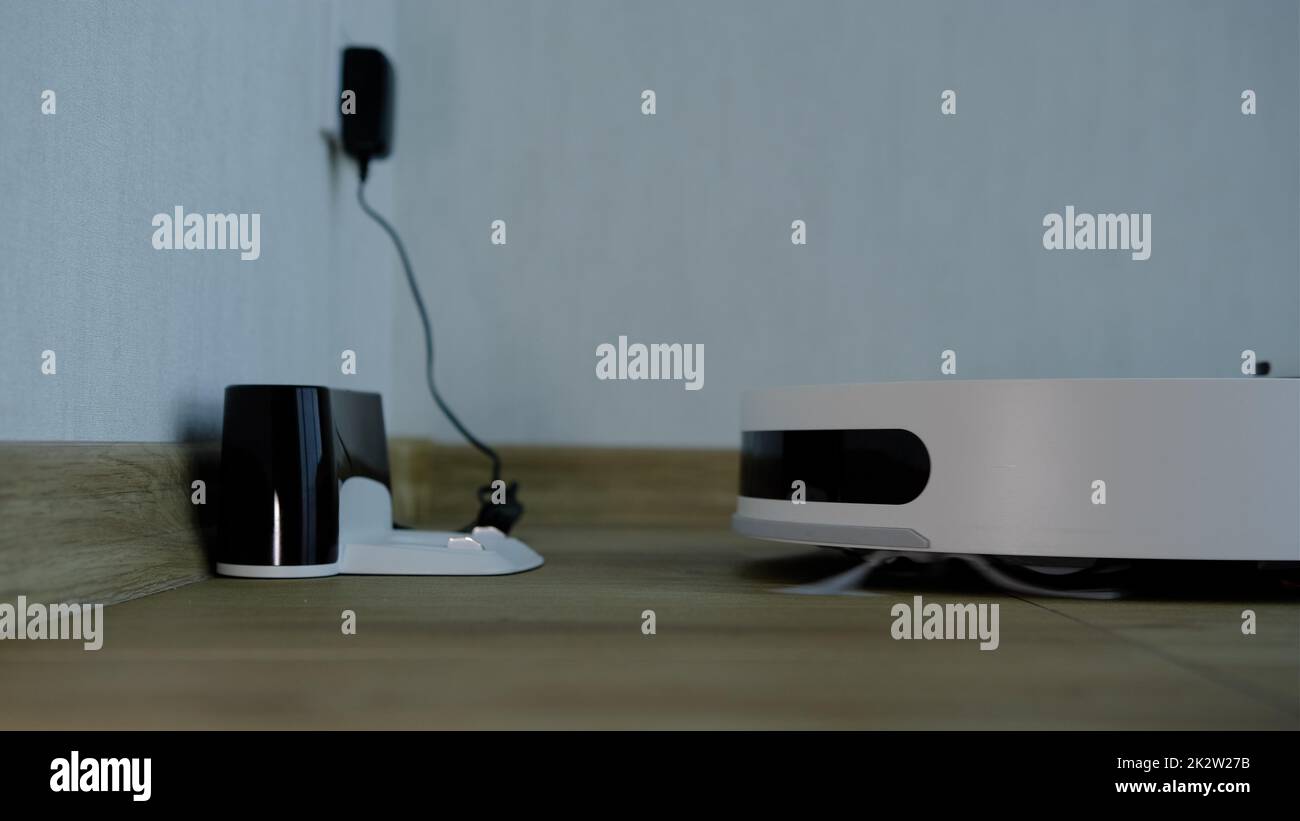 Robotic Vacuum Cleaner start from recharge station. Smart Cleaning