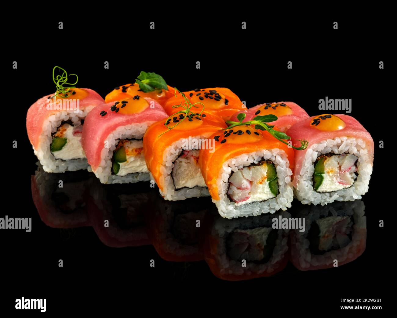 Set sushi roll. Traditional Japanese cuisine. Isolated on black background Stock Photo