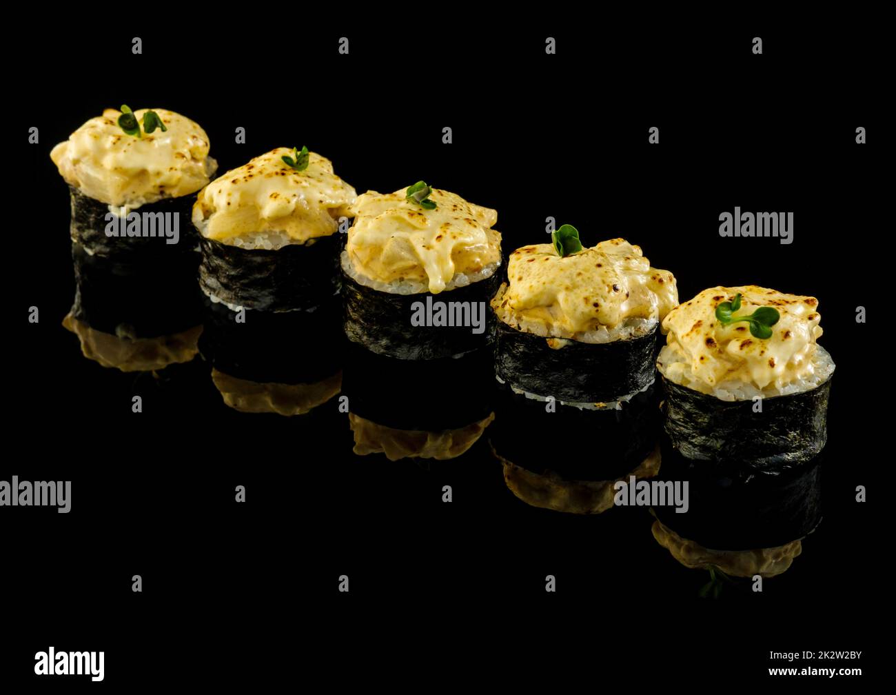 Set sushi roll. Traditional Japanese cuisine. Isolated on black background Stock Photo