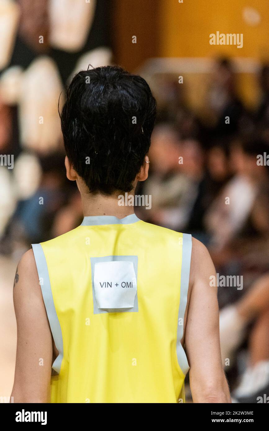 Model, modelling on catwalk for VIN+OMI 'Opinions' show for London Fashion Week 2022. Recycled materials. Sustainable fashion. Brand name tag Stock Photo
