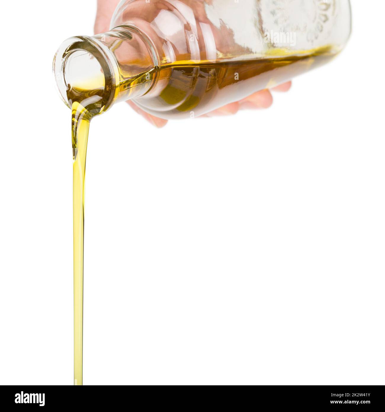 Oil pouring from a bottle Stock Photo Alamy
