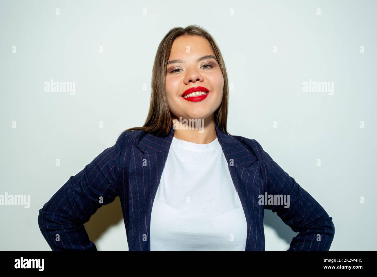 Successful business woman. Positive attitude. Fun lifestyle. Goal achievement. Portrait of cheerful arrogant lady looking at camera smiling isolated o Stock Photo