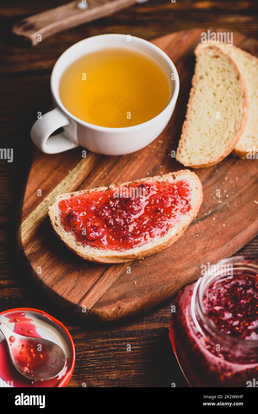 Toast with homemade raspberry jam Stock Photo Alamy