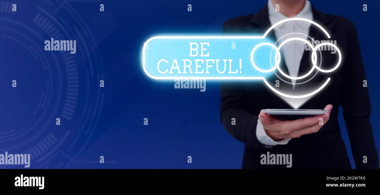 Sign displaying Be Careful. Business showcase making sure of avoiding potential danger mishap or harm Businessman in suit holding open palm symbolizing successful teamwork. Stock Photo