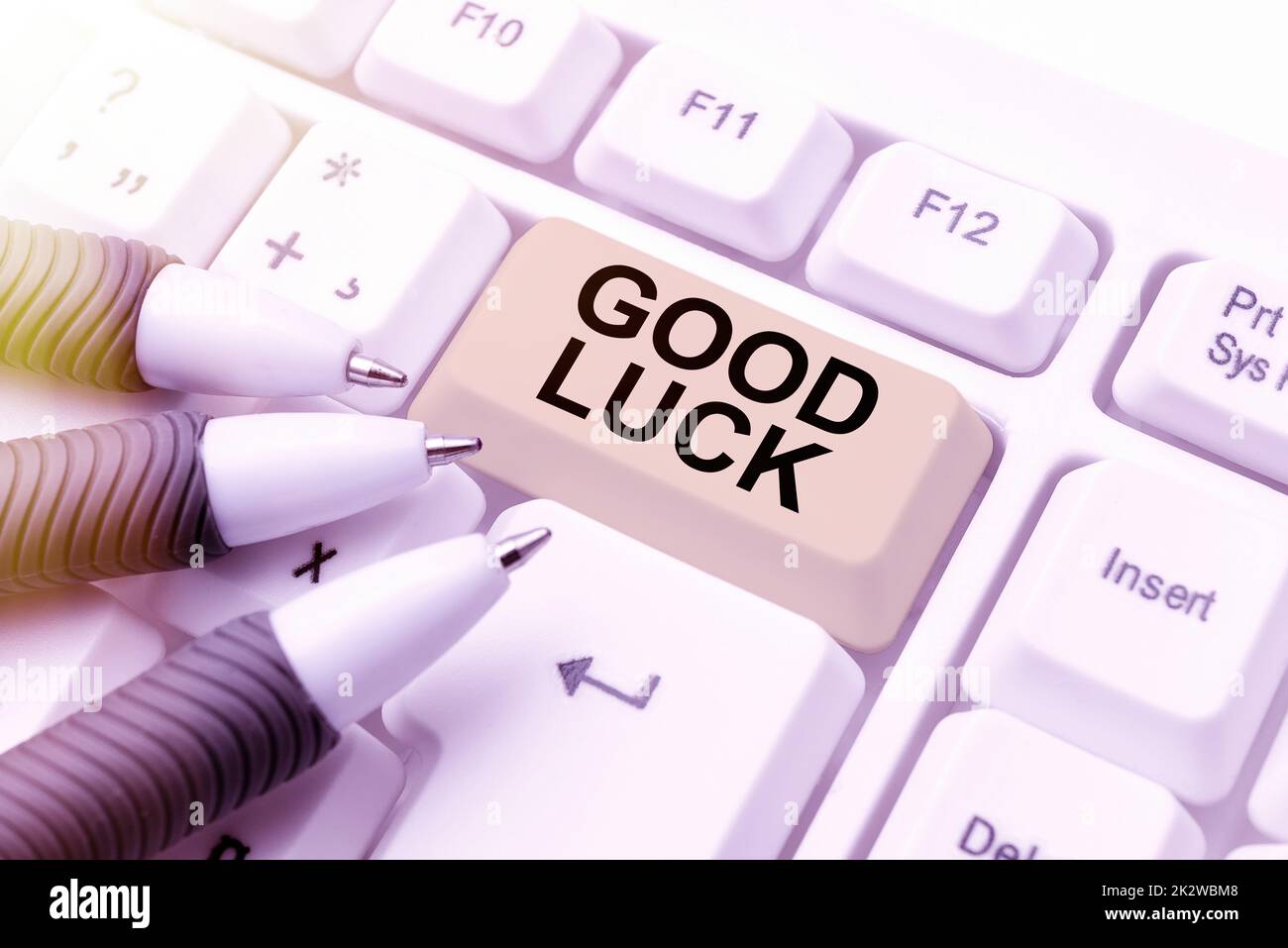 Hand writing sign Good Luck. Concept meaning A positive fortune or a happy outcome that a person can have Frame covered with speech symbols displays speaker making announcements. Stock Photo