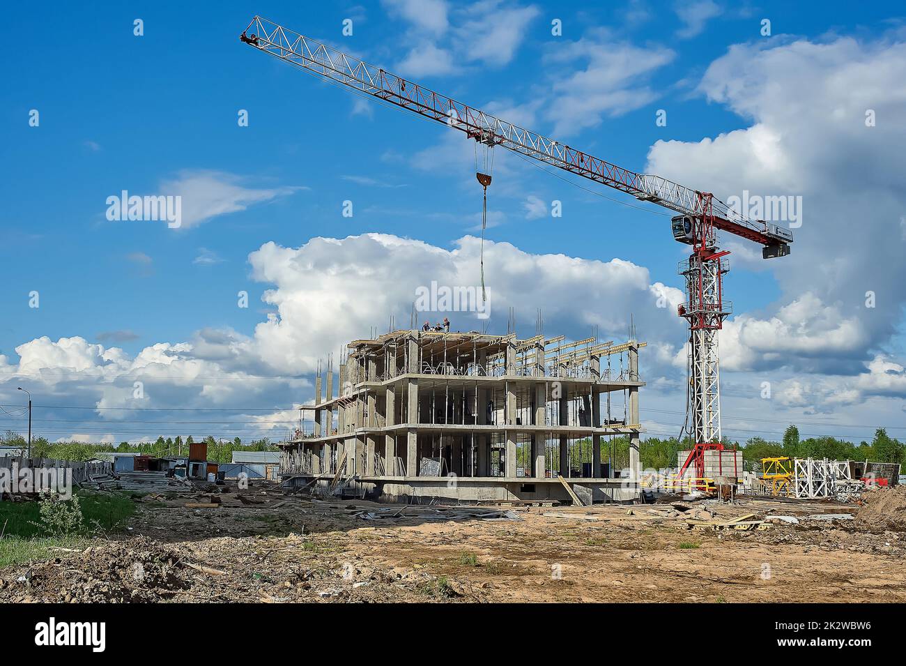 construction of an administrative building in a monolithic way using a tower crane Stock Photo