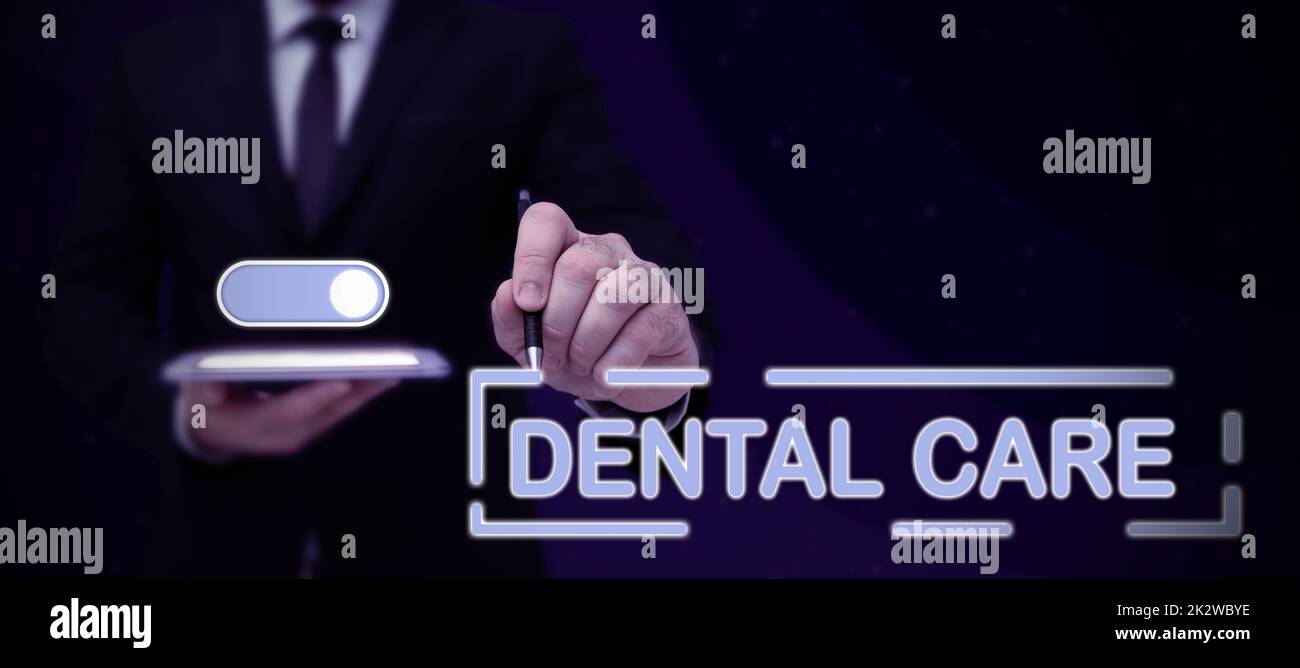 Hand writing sign Dental Care. Business overview maintenance of healthy teeth or to keep it clean for future Lady in suit holding pen symbolizing successful teamwork accomplishments. Stock Photo