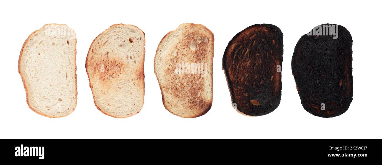 slices of bread at different stages of toasting with last one completely burnt isolated on white Stock Photo
