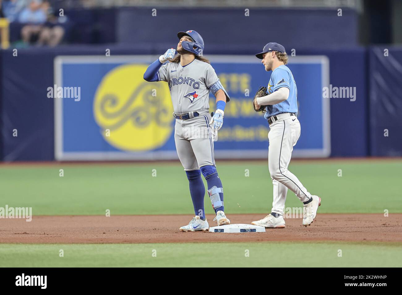 Toronto Blue Jays Shortstop Bo Bichette stands at first base at Rogers  Centre with Detroit Tigers players in the background Stock Photo - Alamy