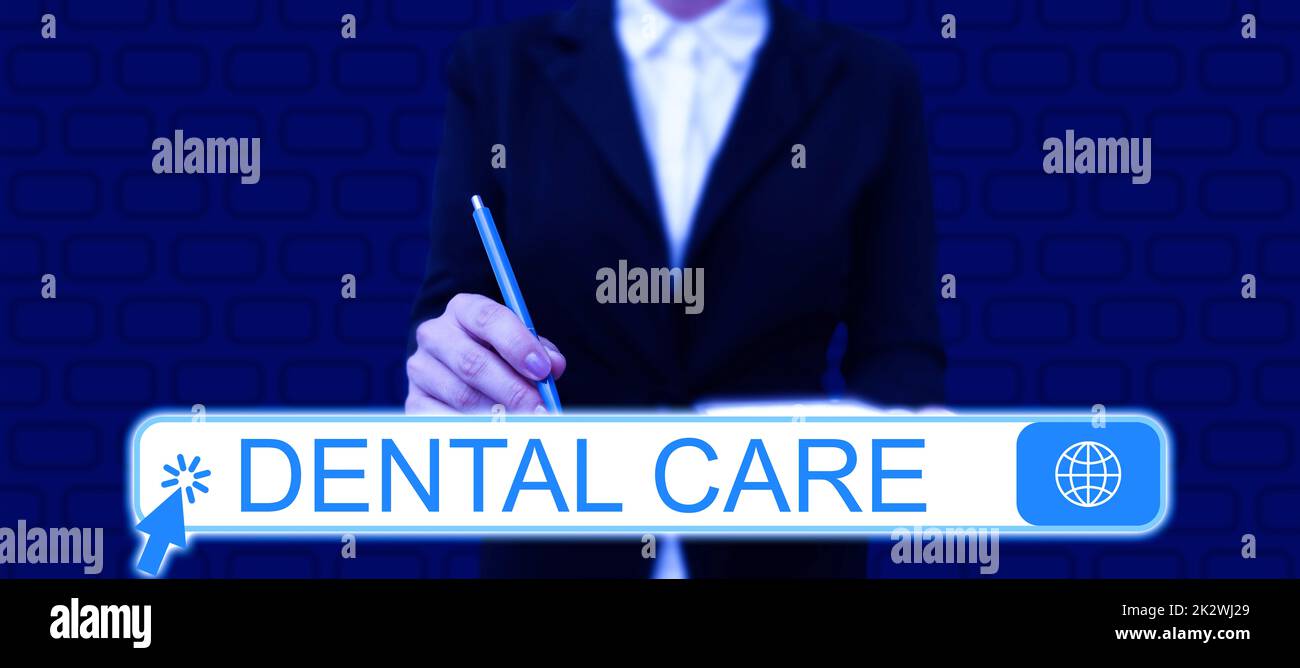 Handwriting text Dental Care. Conceptual photo maintenance of healthy teeth or to keep it clean for future Businessman in suit holding tablet symbolizing successful teamwork. Stock Photo