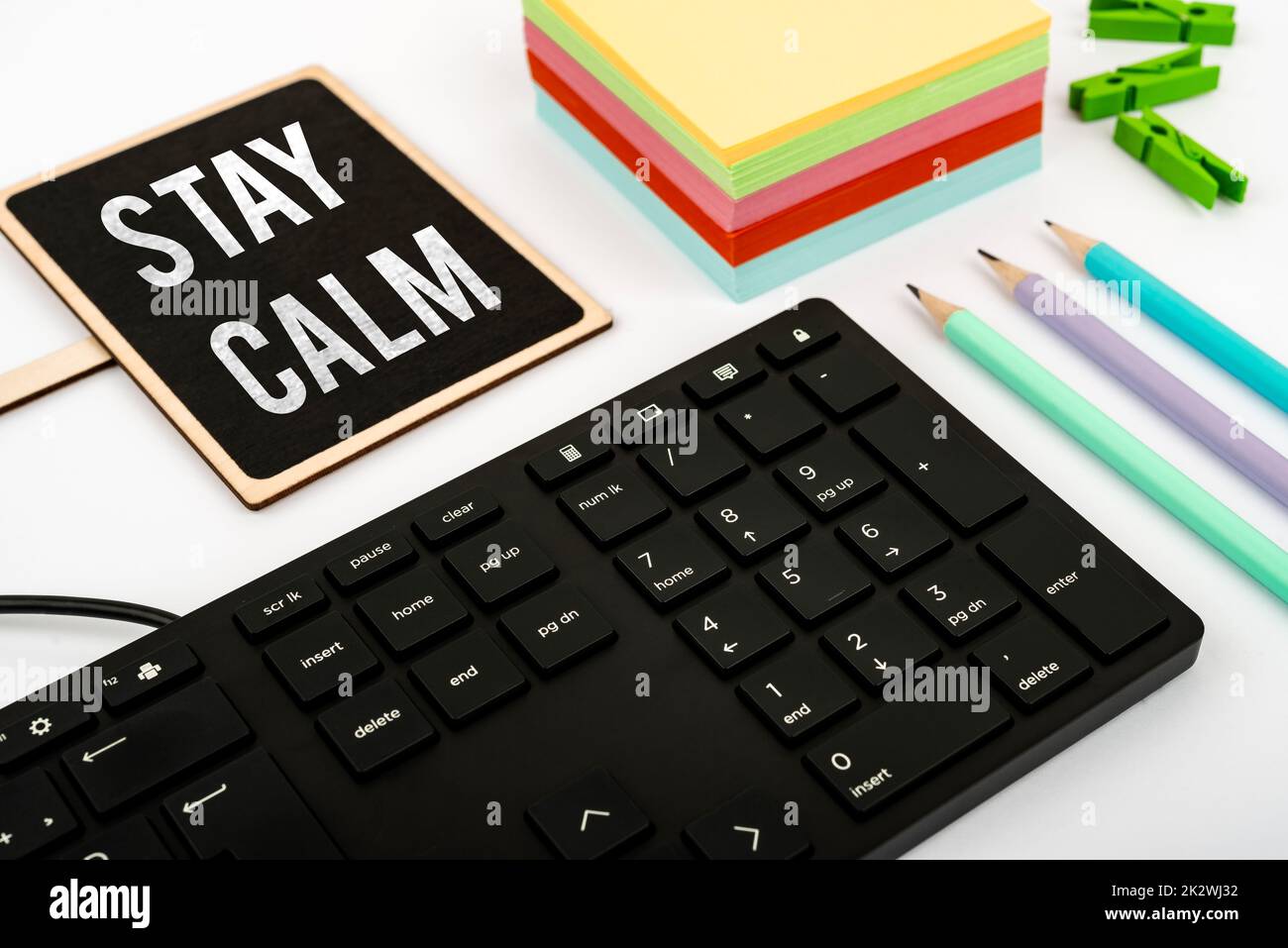 Text showing inspiration Stay Calm. Conceptual photo Maintain in a state of motion smoothly even under pressure Computer Keyboard And Symbol.Information Medium For Communication. Stock Photo