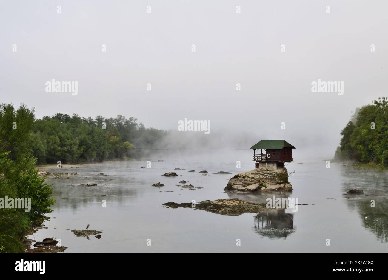 Iconic house on the Drina river between Serbia and Bosnia Herzegovina on a misty morning Stock Photo