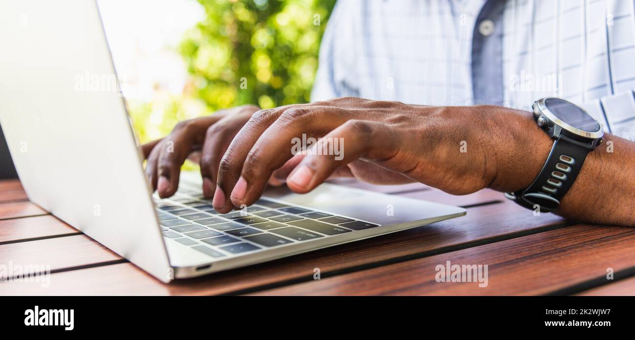 businessman work from home using laptop computer typing keyboard Stock Photo