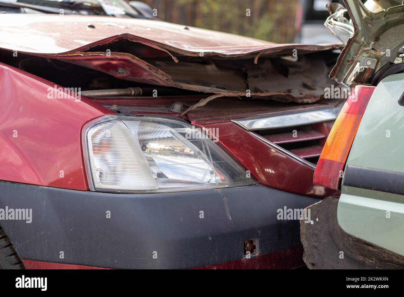 Traffic accident on the street, damaged car after a collision in the