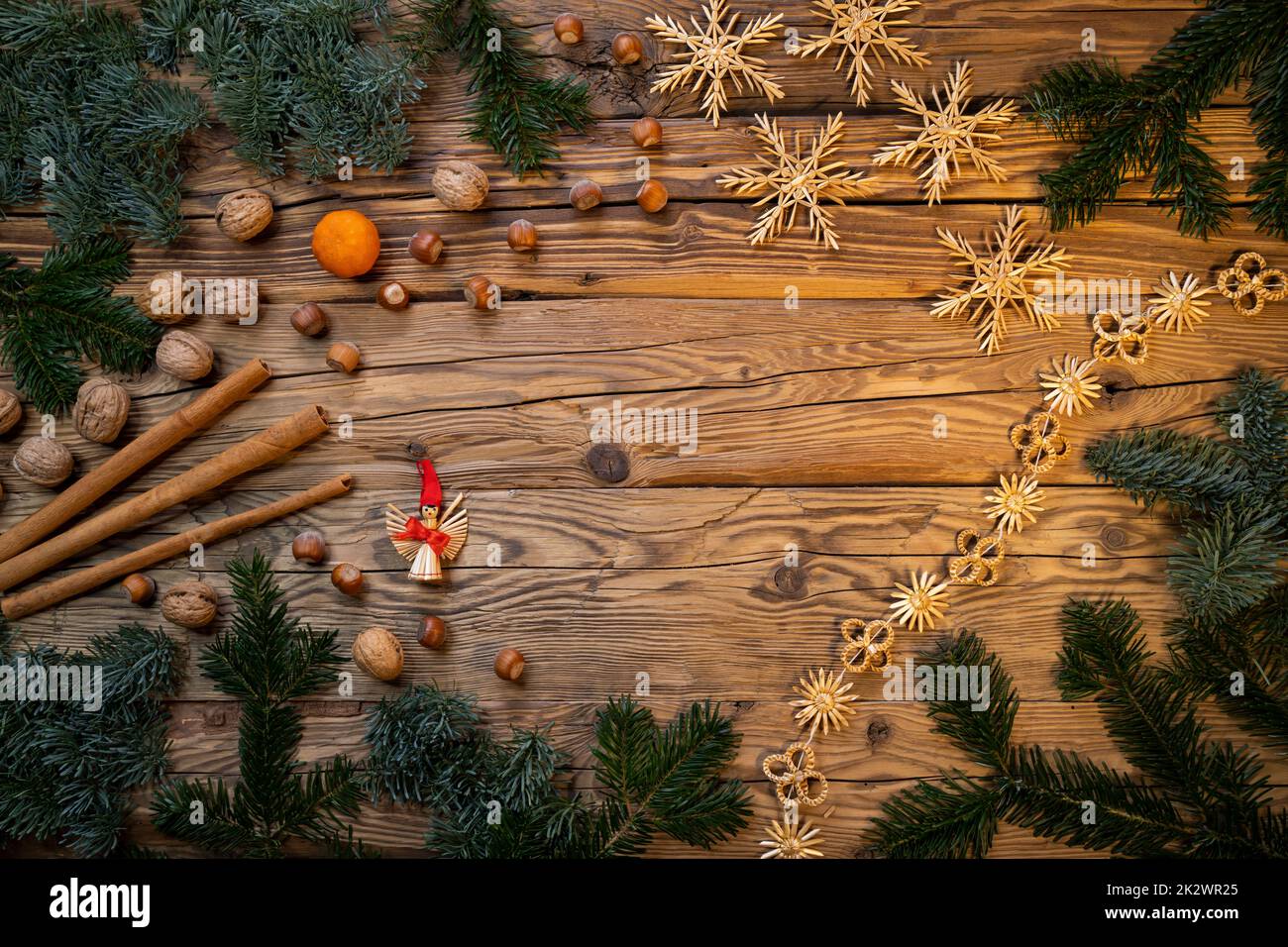 Traditional Czech Christmas on wood decoration with twig, apple, orange, fruit Stock Photo