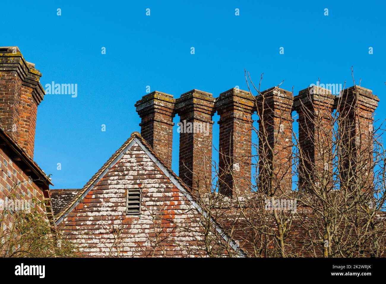 Tudor brick chimneys at Batemans, Burwash, East Sussex, England Stock Photo