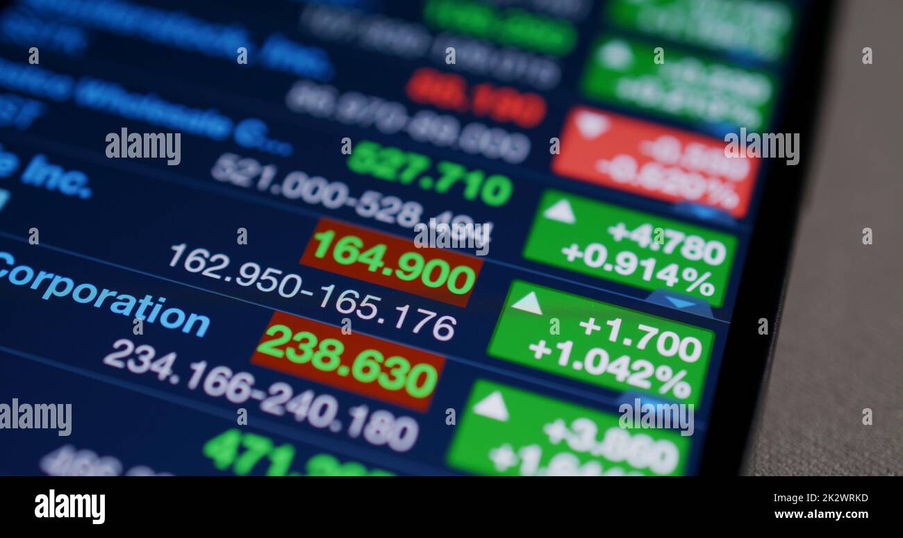 Digital tablet computer showing the stock market data Stock Photo