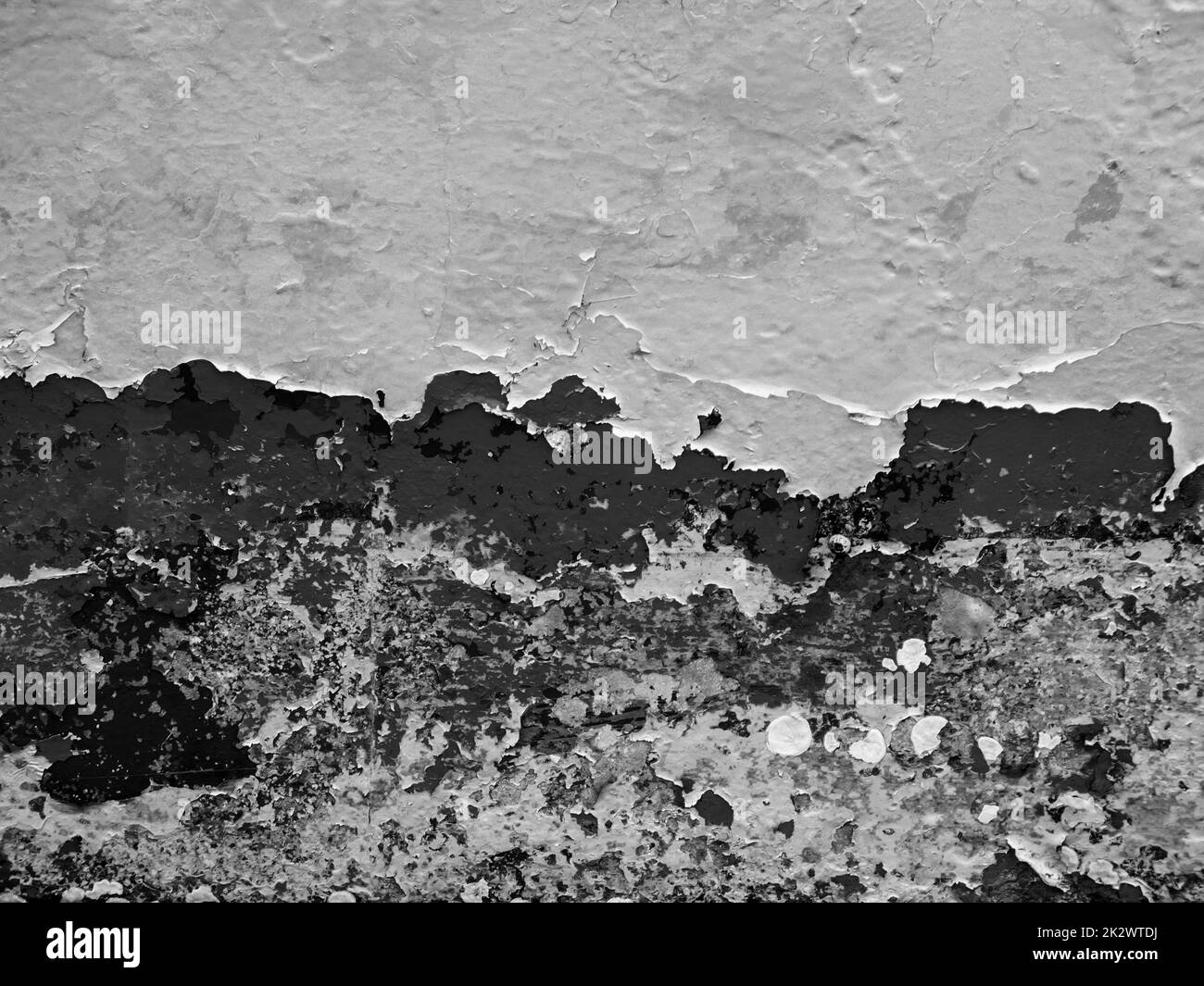 Formatfilling view of a metal wall with chipped blue paint in various