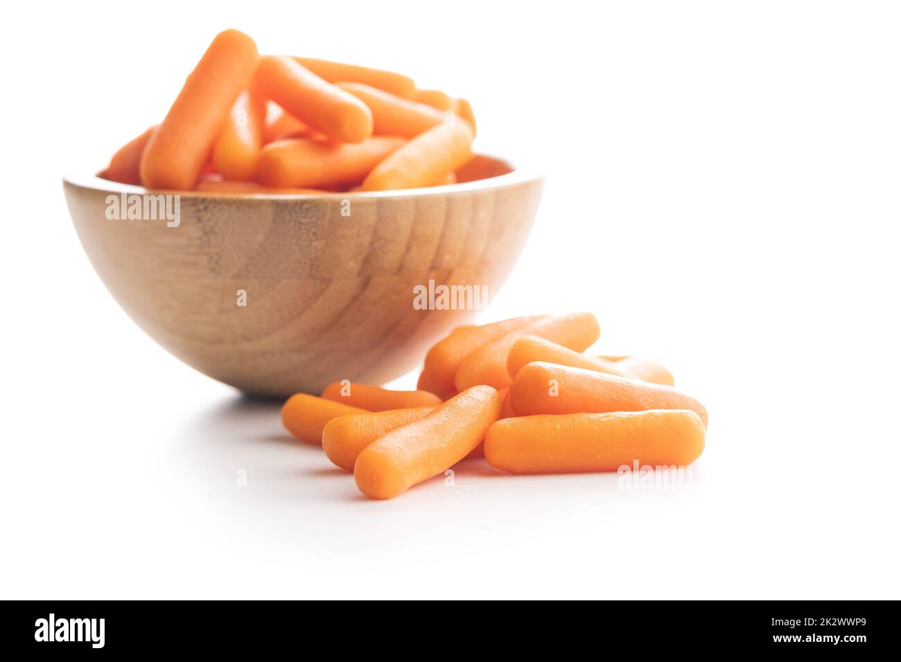 Baby carrot vegetable. Mini orange carrots isolated on white background Stock Photo Alamy
