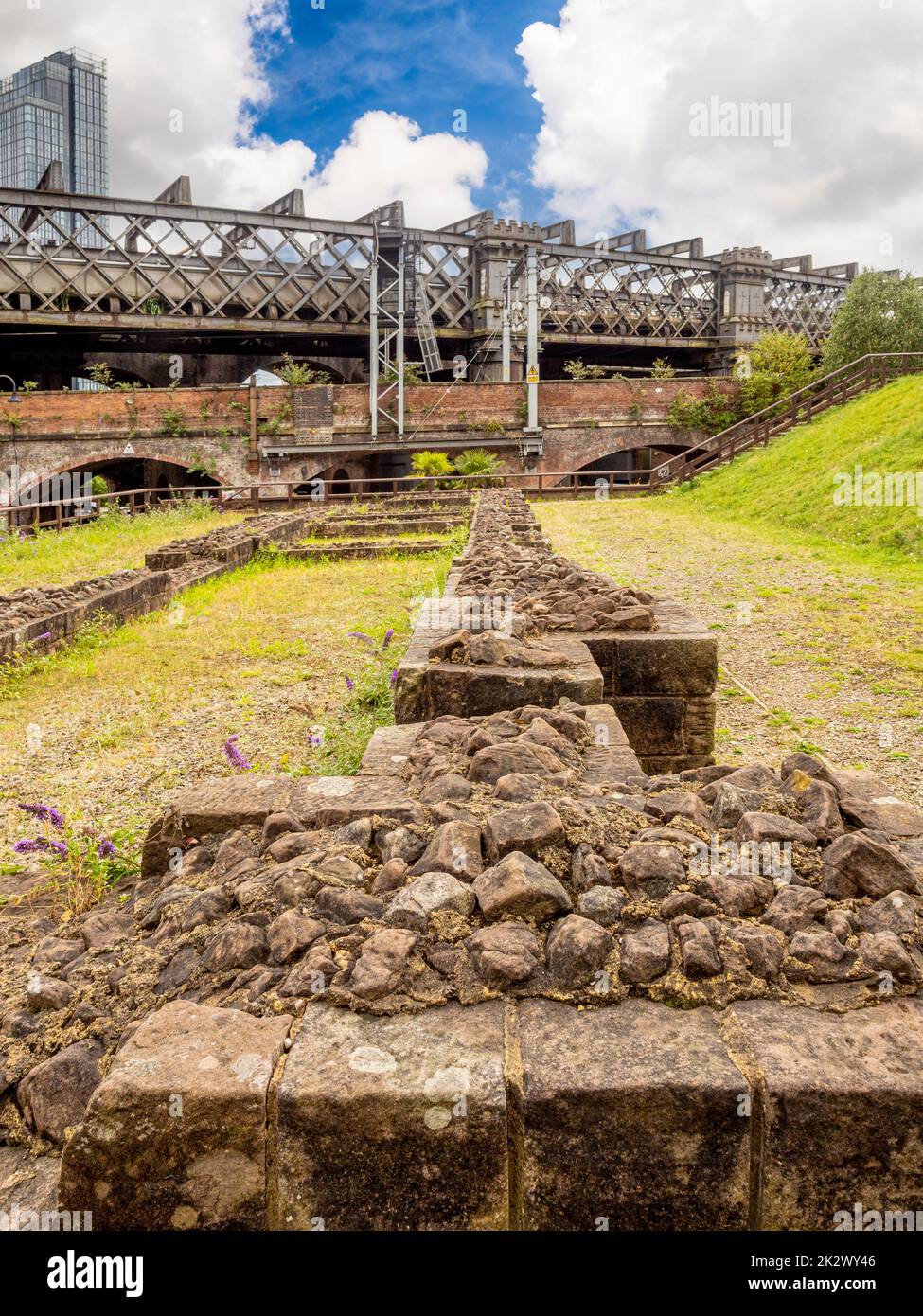 Remains of a Roman Granary with Castlefield Viaduct in the distance. Castlefield, Manchester. UK Stock Photo
