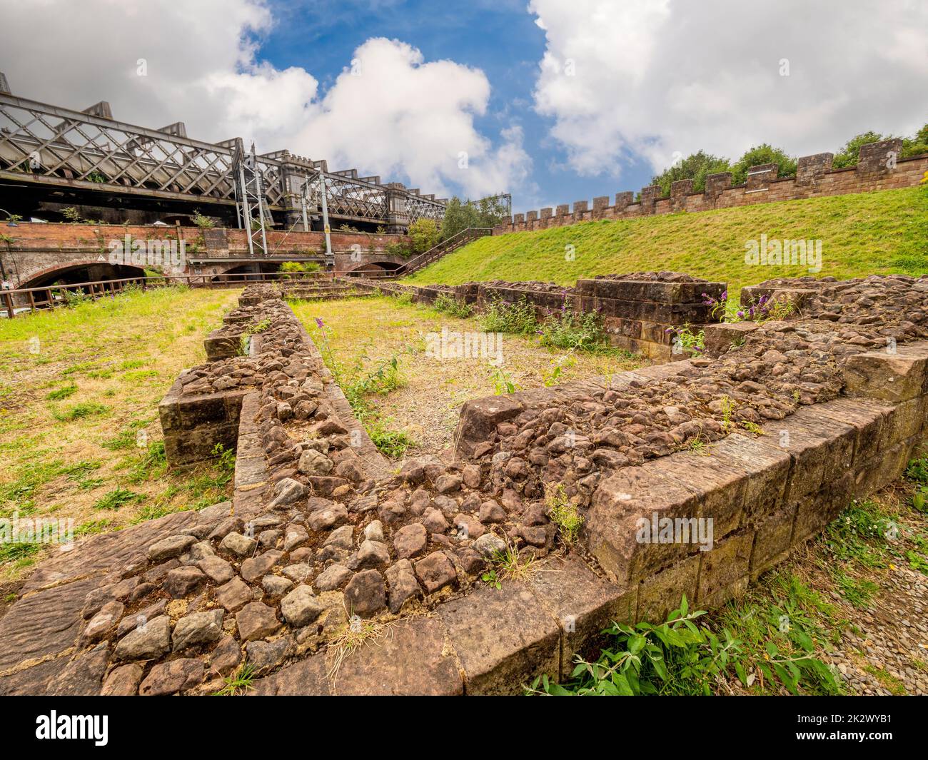 Remains of a Roman Granary with Castlefield Viaduct in the distance. Castlefield, Manchester. UK Stock Photo
