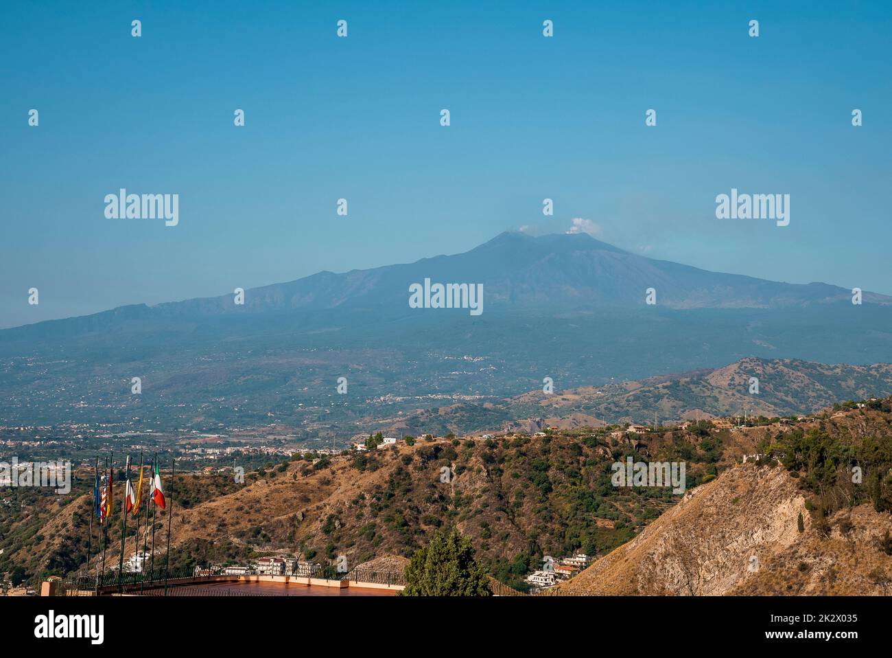 Beautiful Mount Etna and hotel Elios with blue sky in background and Stock Photo