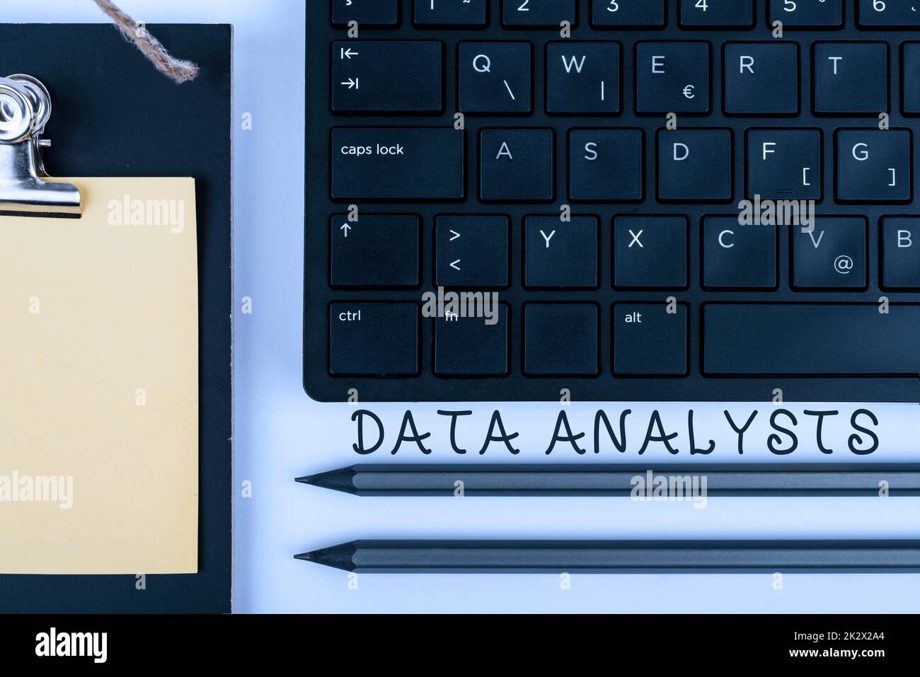 Writing displaying text Data Analysts. Conceptual photo Programmer Design and Create Report Identifies patterns Computer Keyboard And Symbol.Information Medium For Communication. Stock Photo