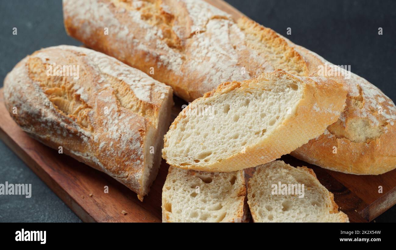 White french baguette or bread roll closeup, traditional food Stock