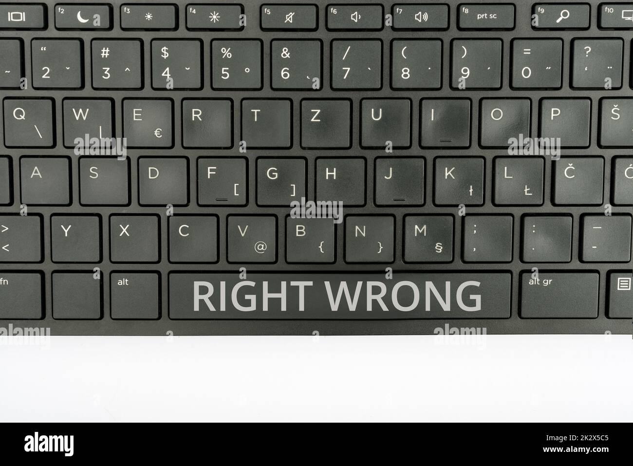 Handwriting text Right Wrong. Conceptual photo choose between two decisions correct and bad one to make Computer Keyboard And Symbol.Information Medium For Communication. Stock Photo