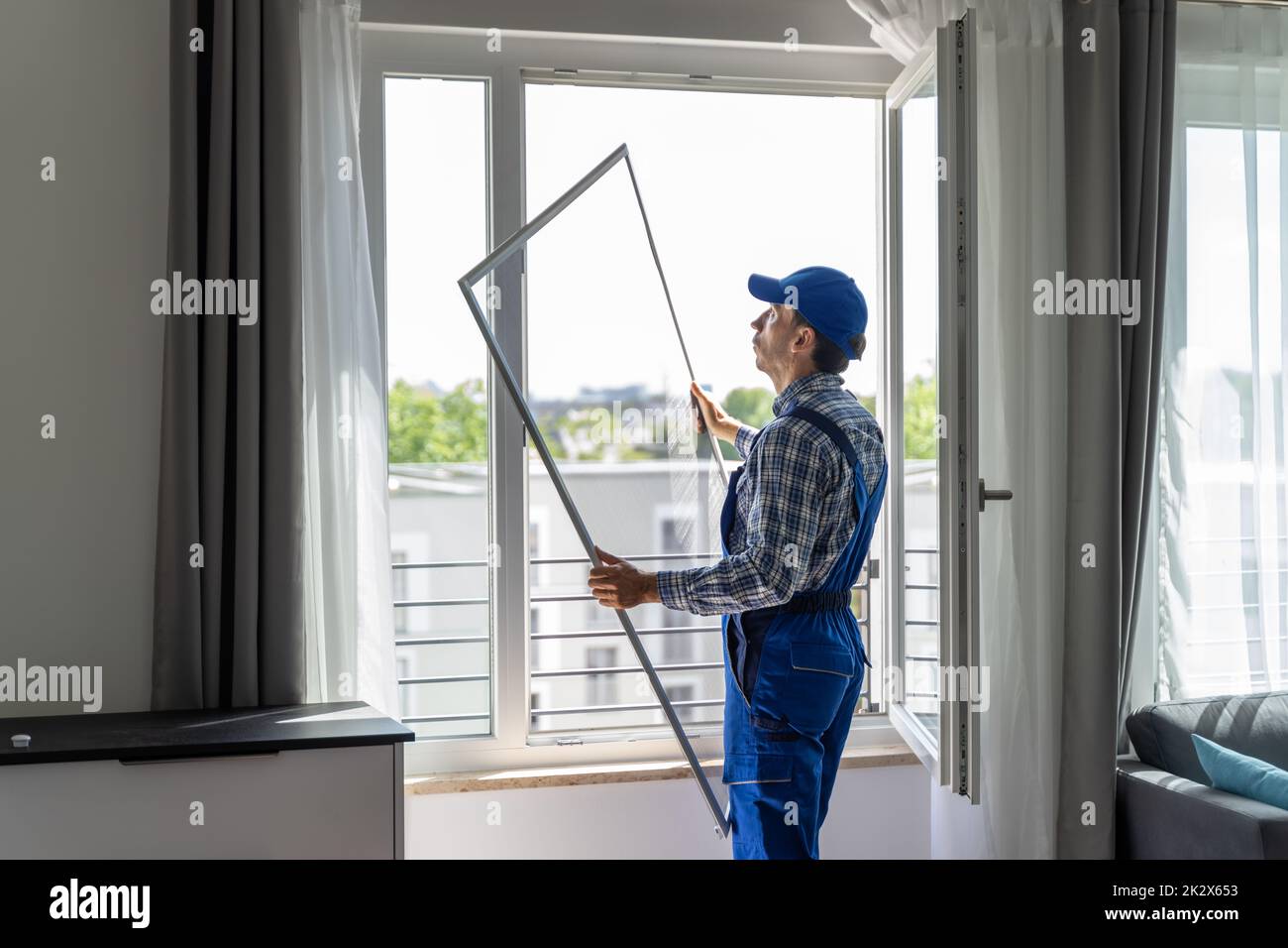 Mosquito Net Frame Install Service Stock Photo - Alamy