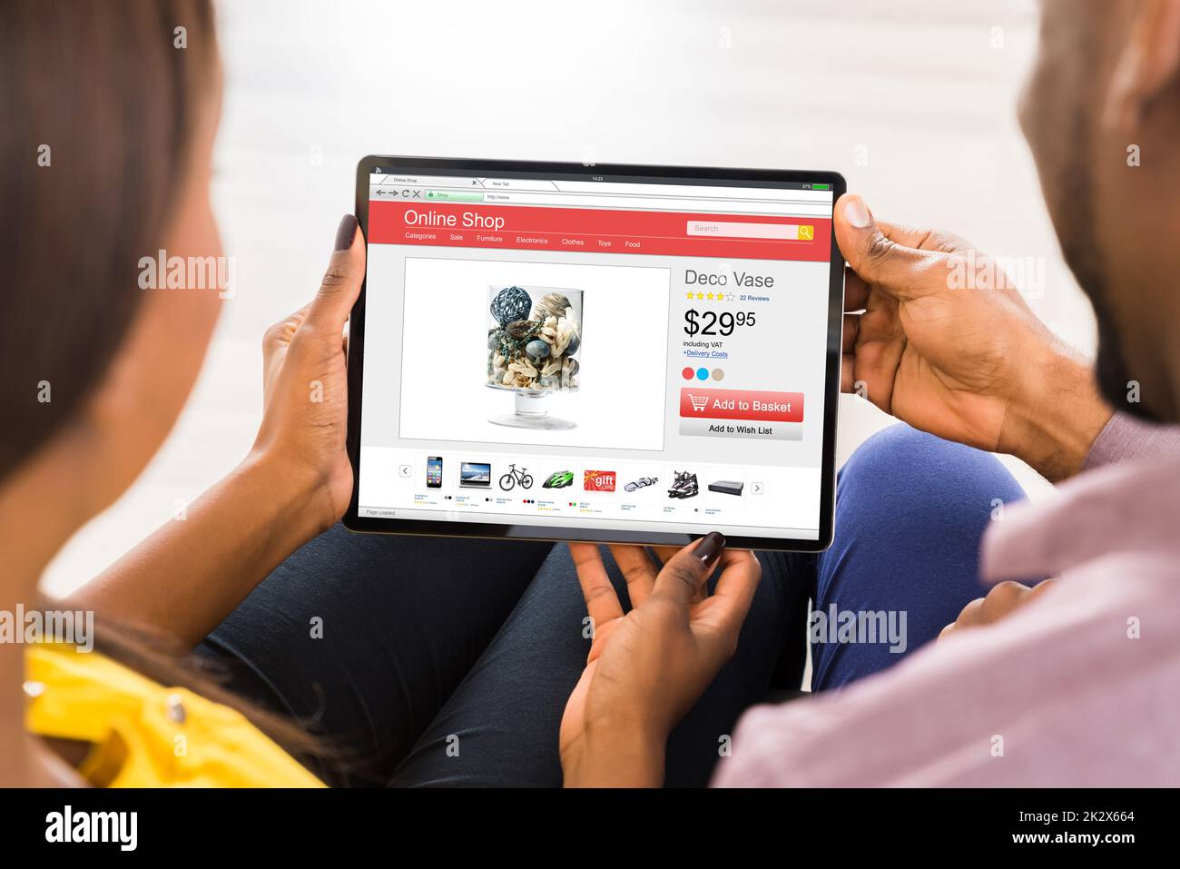 Young Couple Using Digital Tablet Stock Photo