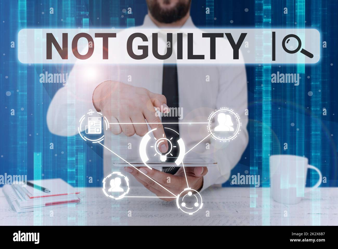 Handwriting text Not Guilty. Business approach someone is innocent didnt commit specific crime He free Businessman pointing down tablet represents global innovative thinking. Stock Photo