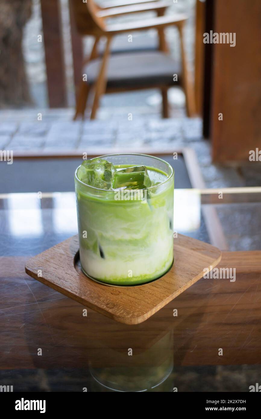 Iced milk matcha green tea drink Stock Photo Alamy