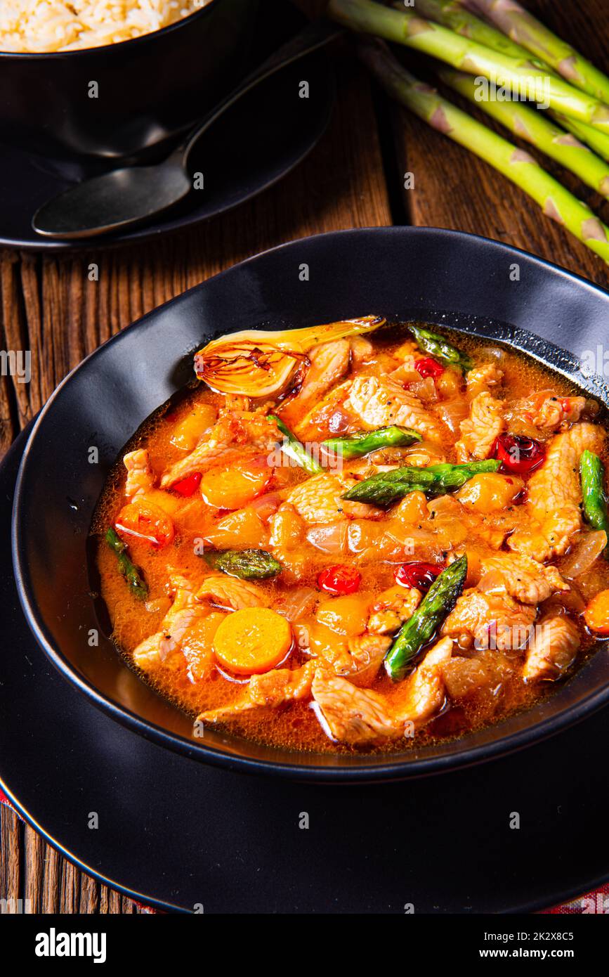 colorful turkey fricassee with asparagus and paprika Stock Photo