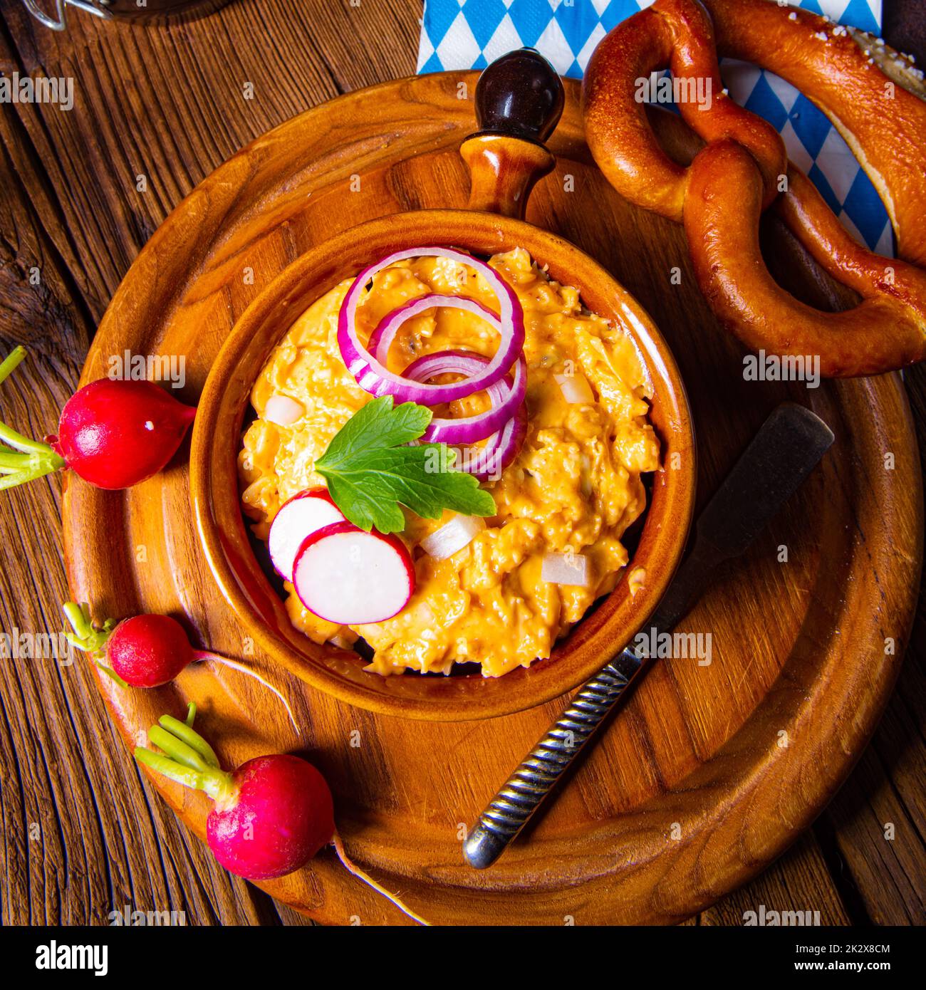 rustic Bavarian obazda with radishes and onions Stock Photo - Alamy