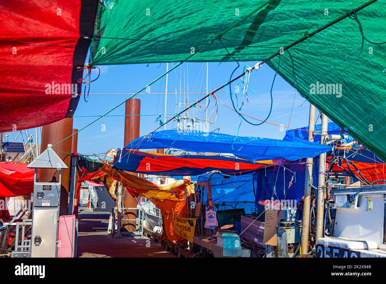 Colourful tarpaulins covering the Fishermans Wharf fresh fish market in Steveston British Columbia Canada Stock Photo
