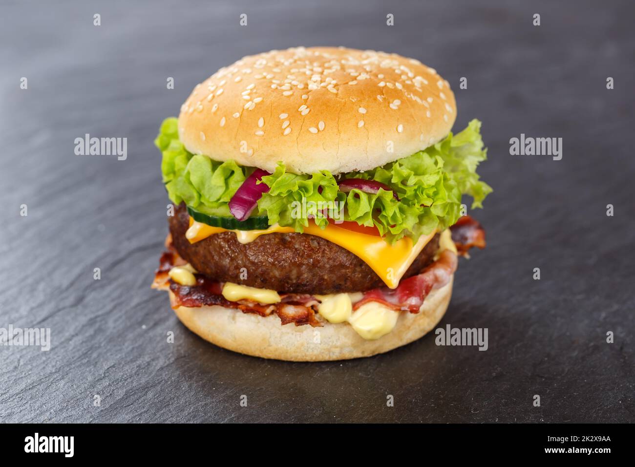 Hamburger Cheeseburger fastfood fast food on a slate burger Stock Photo