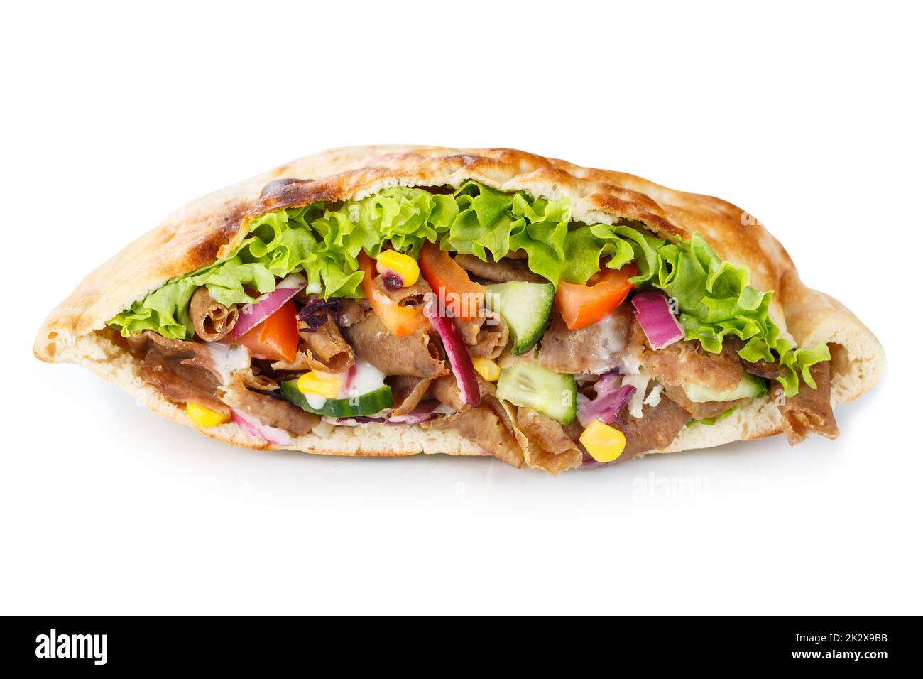 DÃ¶ner Kebab Doner Kebap fast food in flatbread isolated on a white background Stock Photo