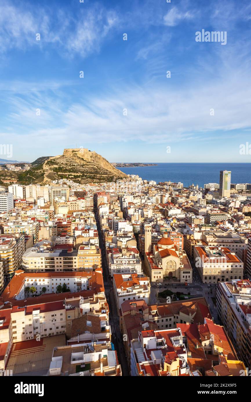 Alicante Alacant overview of town city and castle view Castillo Santa Barbara travel traveling holidays vacation portrait format in Spain Europe Stock Photo