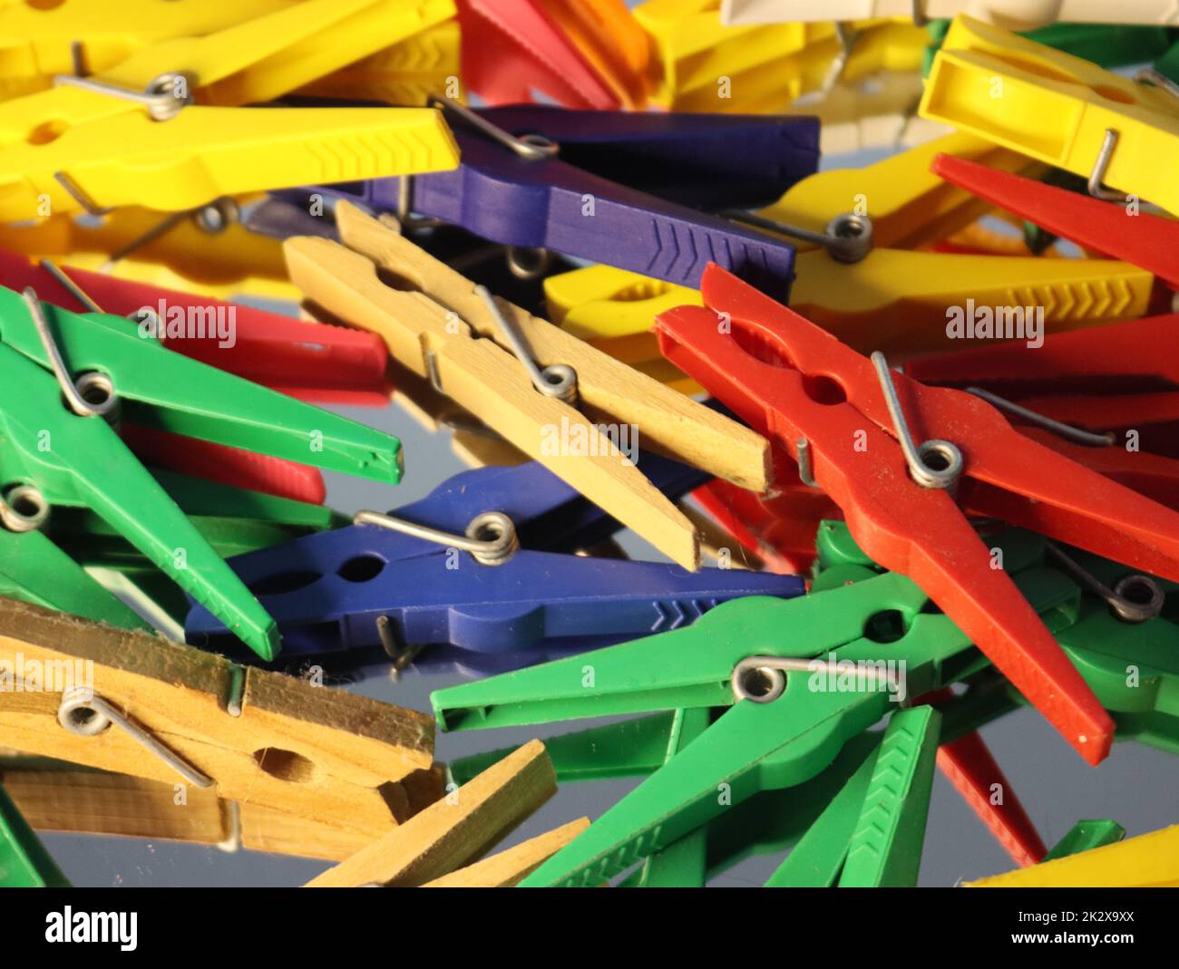 tweezers to hang clothes to dry in the sun hang garments hold Stock Photo
