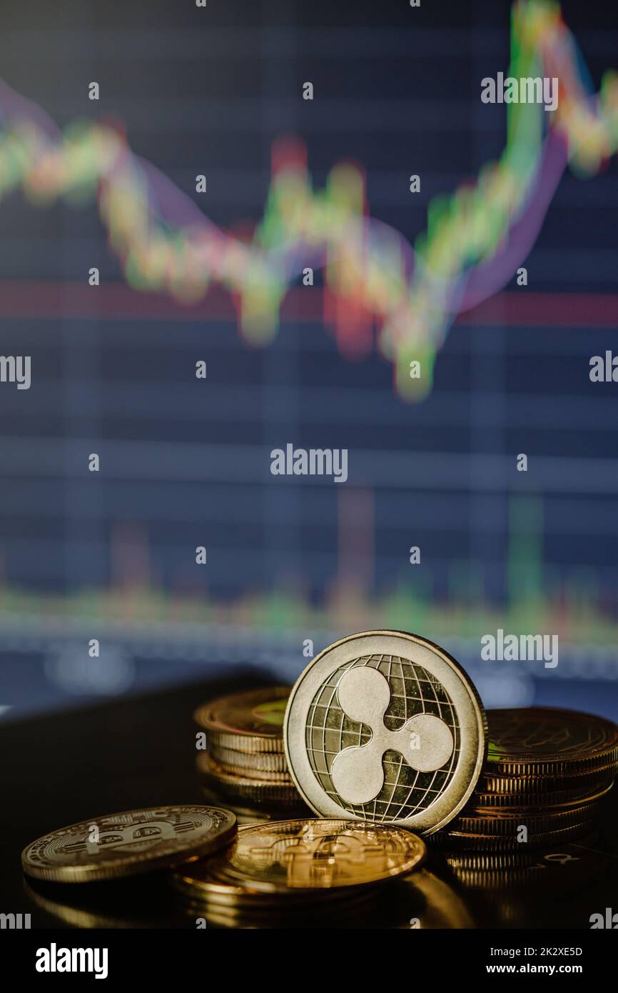 Gold Ripple with candle stick graph chart and digital background Stock