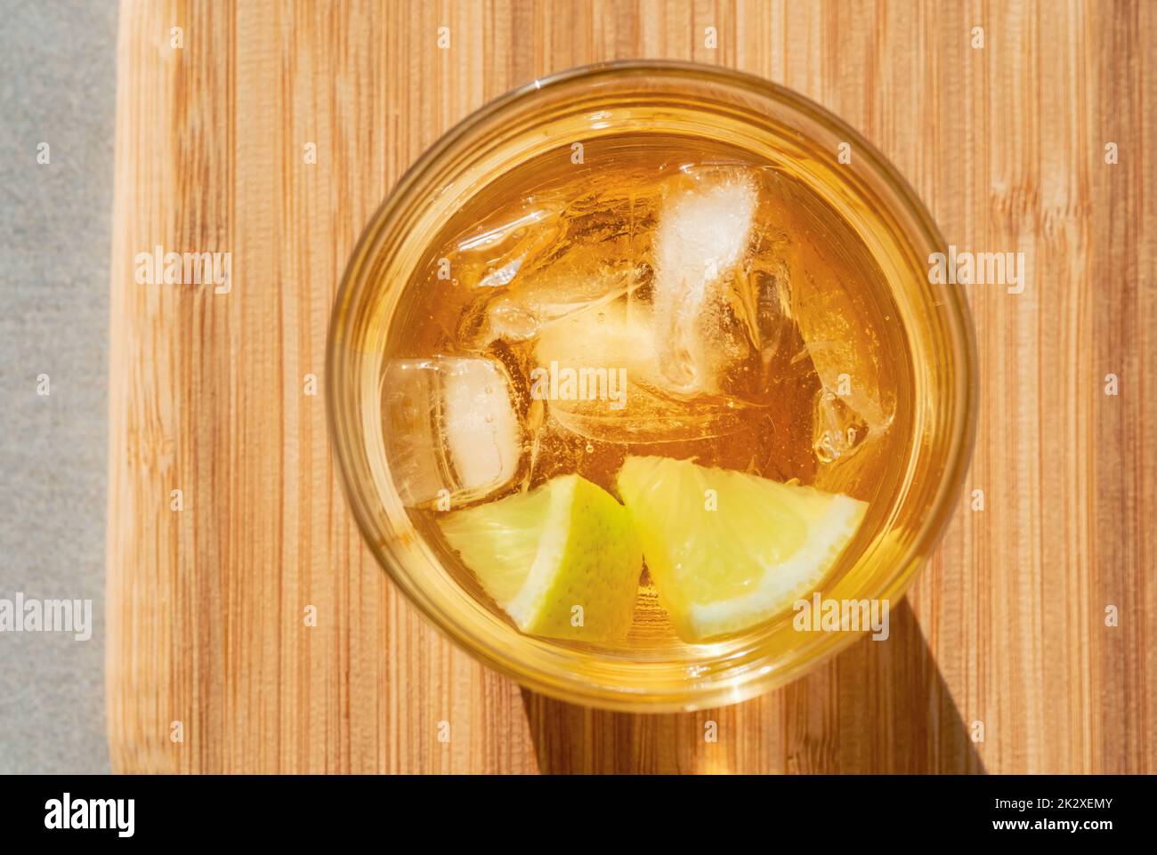 Golden rum on the rocks Stock Photo Alamy