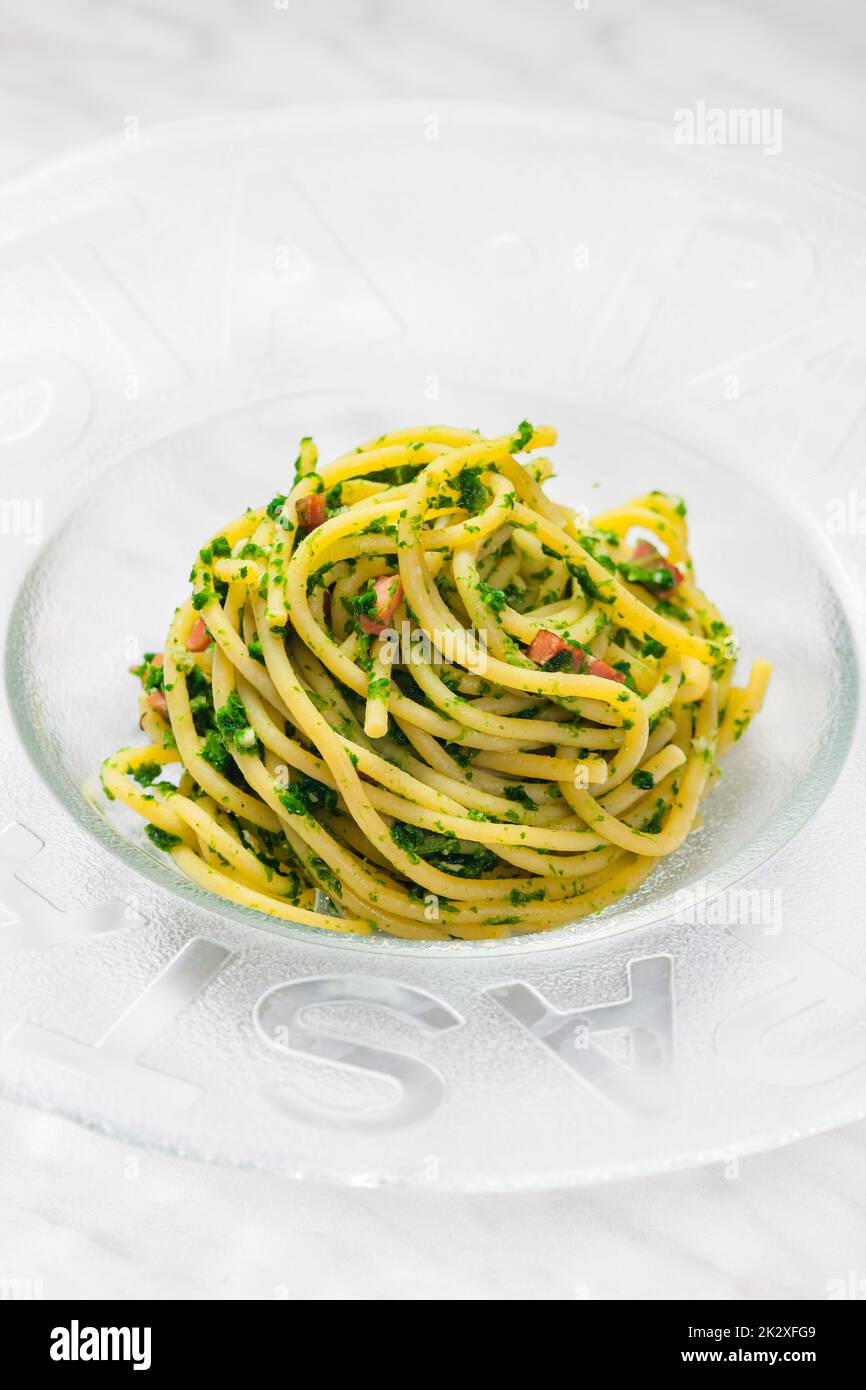spaghetti with bacon and parsley Stock Photo Alamy